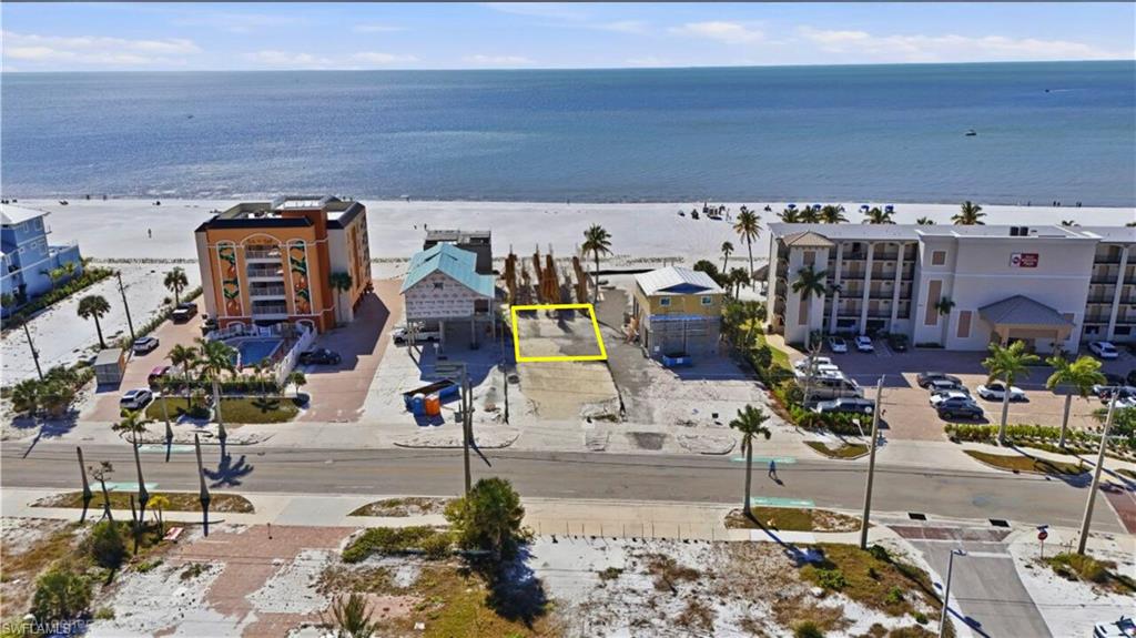 Drone / aerial view of waterfront with a beach - Virtually Edited Image