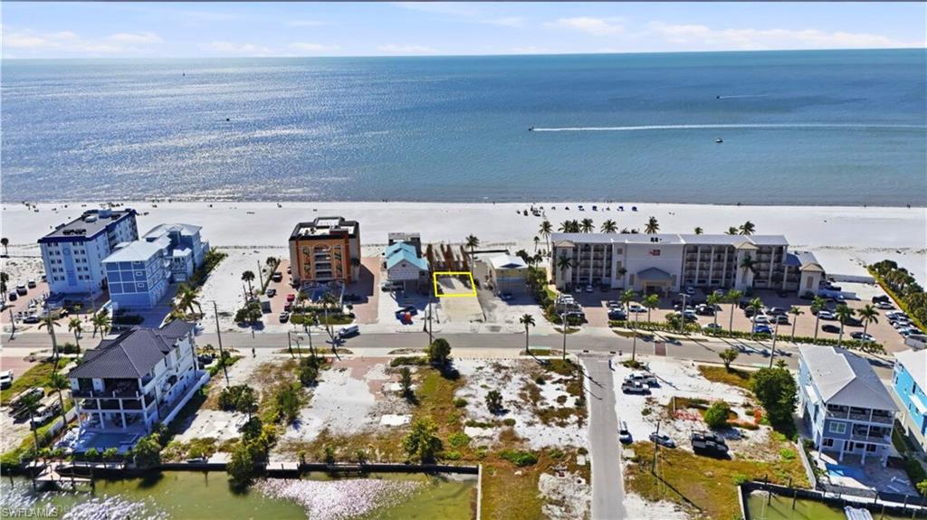 Drone / aerial view of waterfront with a beach - Virtually Edited Image