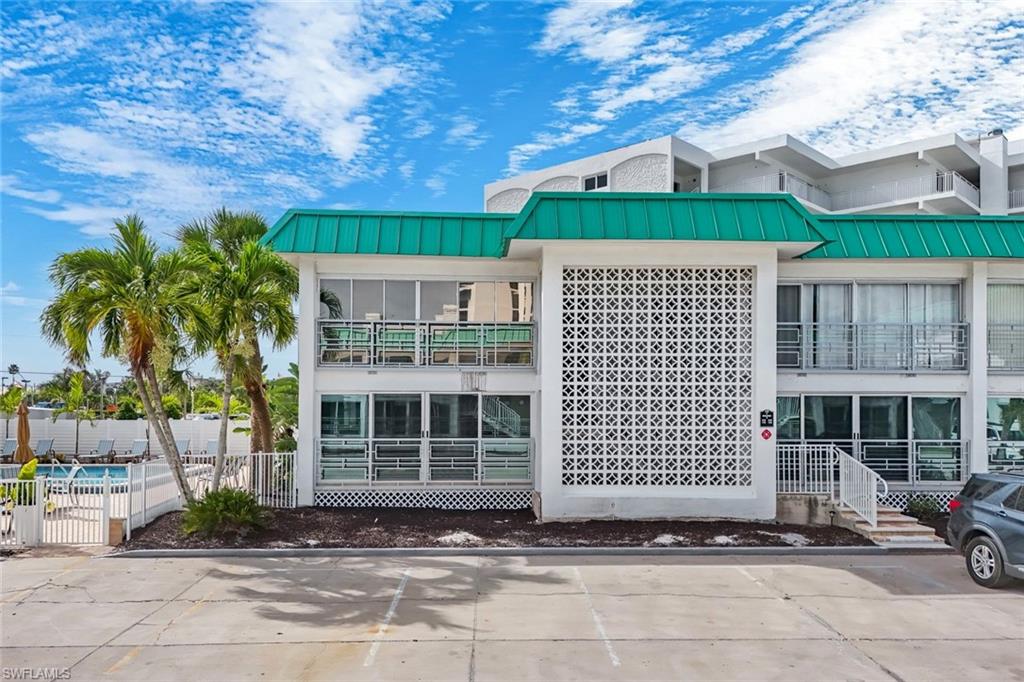 This stunning END UNIT is right next to the pool.