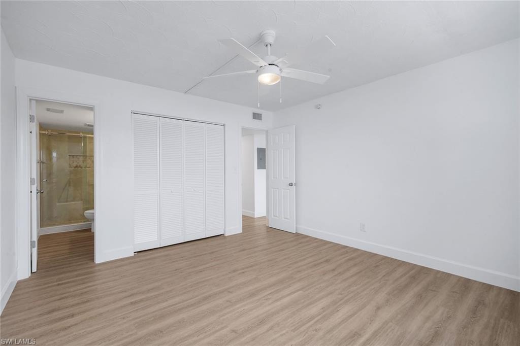 Primary suite offers plenty of room for a king bed.