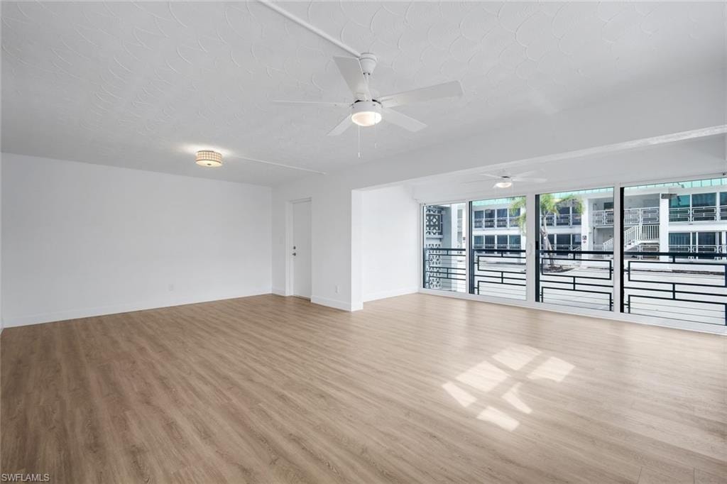 View of living and dining area from kitchen.