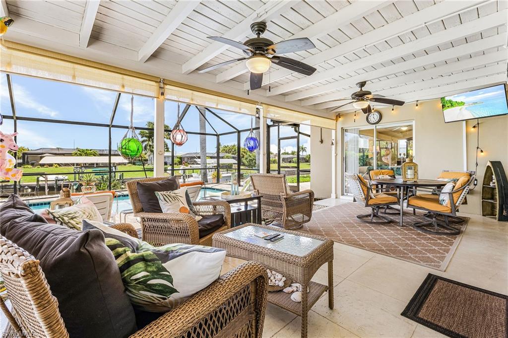 Covered patio with sliders to the Primary bedroom and great room, custom ceiling and