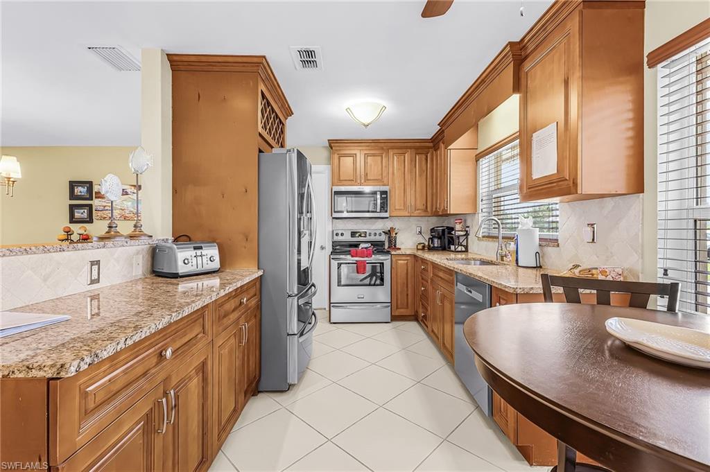 Beautiful remodeled kitchen with pass thru to the dining area