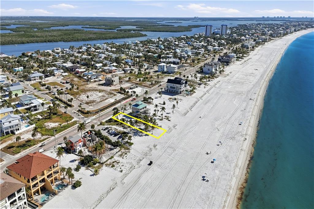 Aerial view of waterfront with a beach - Virtually Edited Image