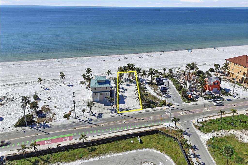 Aerial view of waterfront with a beach - Virtually Edited Image