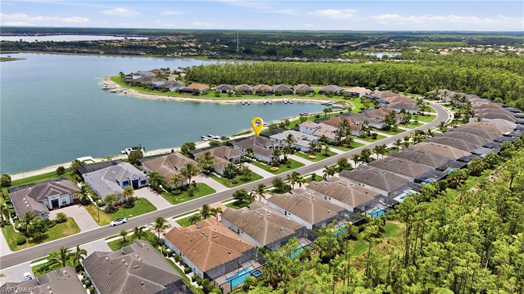 Aerial perspective showcasing a residential community with waterfront properties