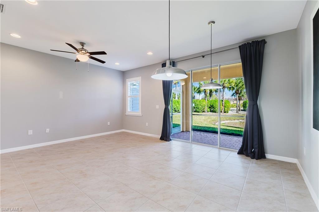 Unfurnished room with light tile patterned floors, ceiling fan, and recessed lighting
