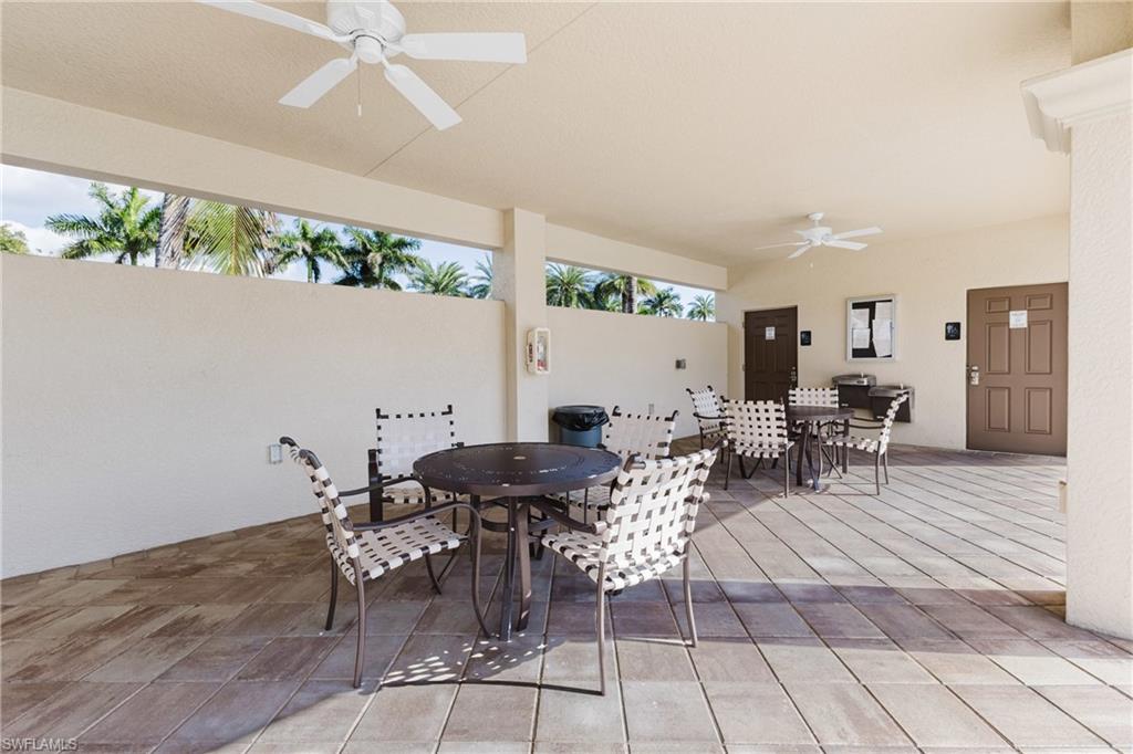 View of patio featuring outdoor dining space and a ceiling fan