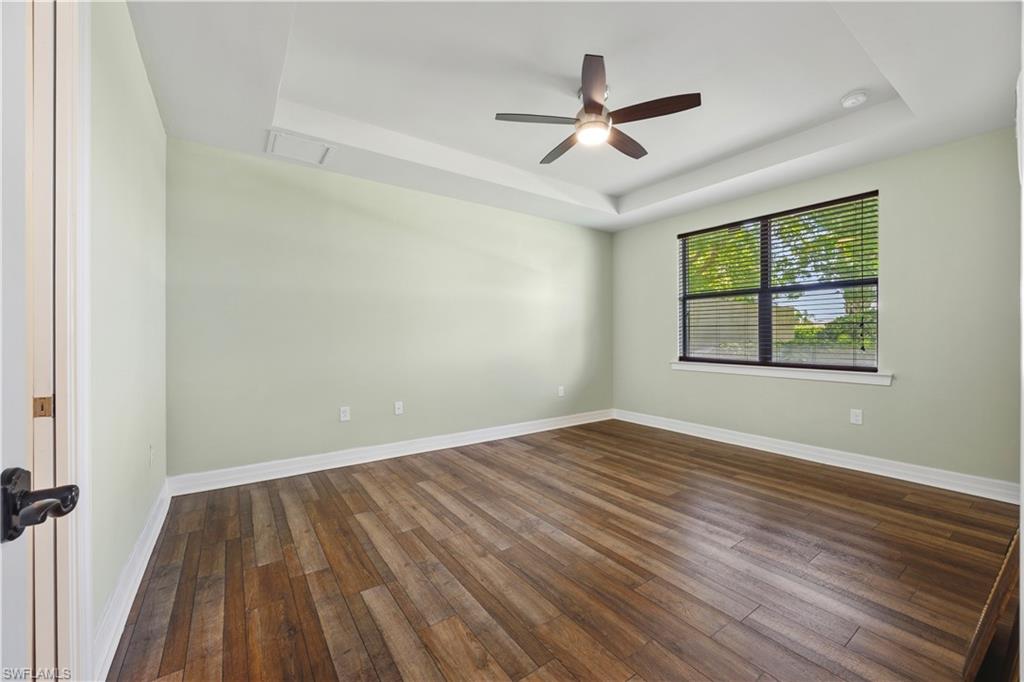 Primary bedroom featuring vinyl flooring