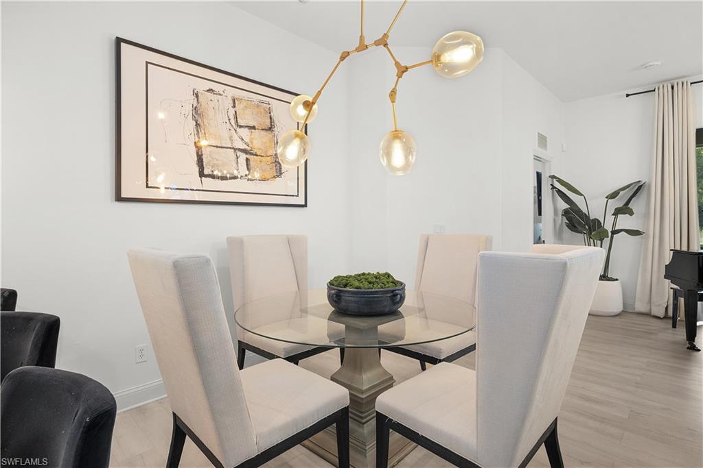 Dining area with a modern chandelier