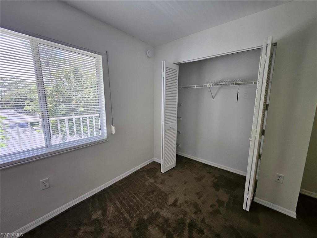 Guest bedroom with plenty of closet space and nice window
