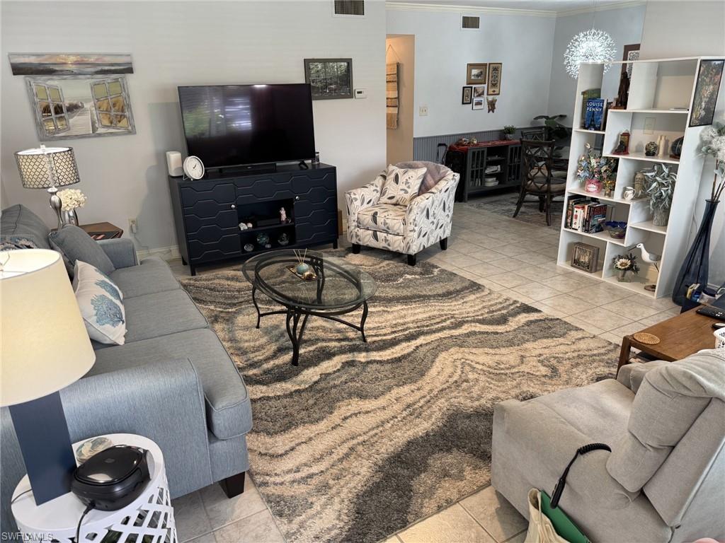 Step inside and find this huge living room that looks into the separate dining room.