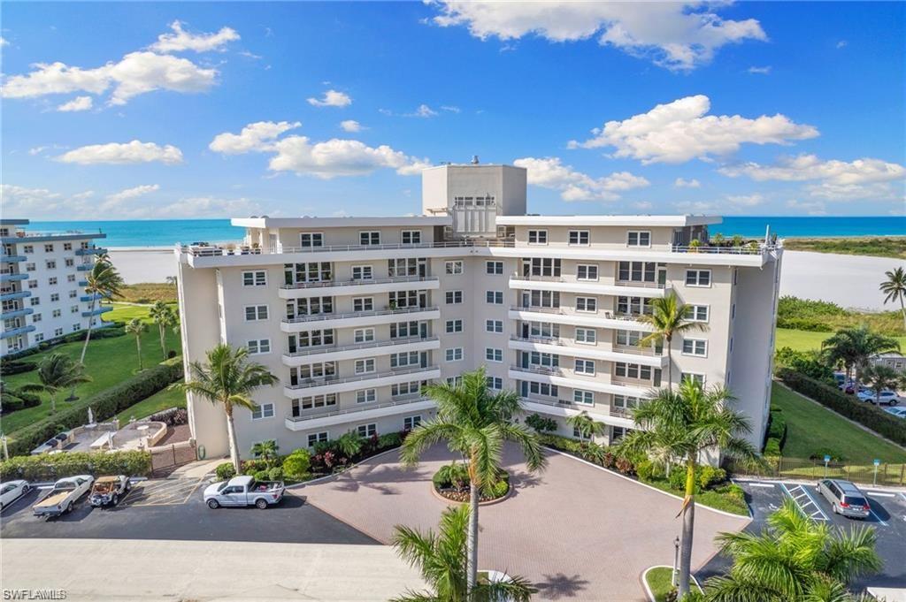 View of building exterior featuring a water view