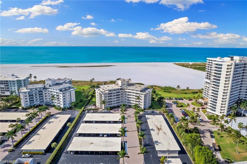 Bird's eye view with a beach view and a water view
