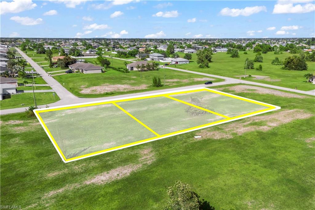 Perspective from the back of the lots looking out toward the road, offering a sense of depth and layout.
