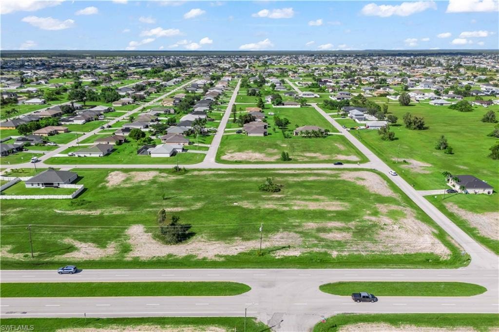 Surrounding neighborhood image showcasing ongoing development and new homes — strong signs of growth and increasing value.