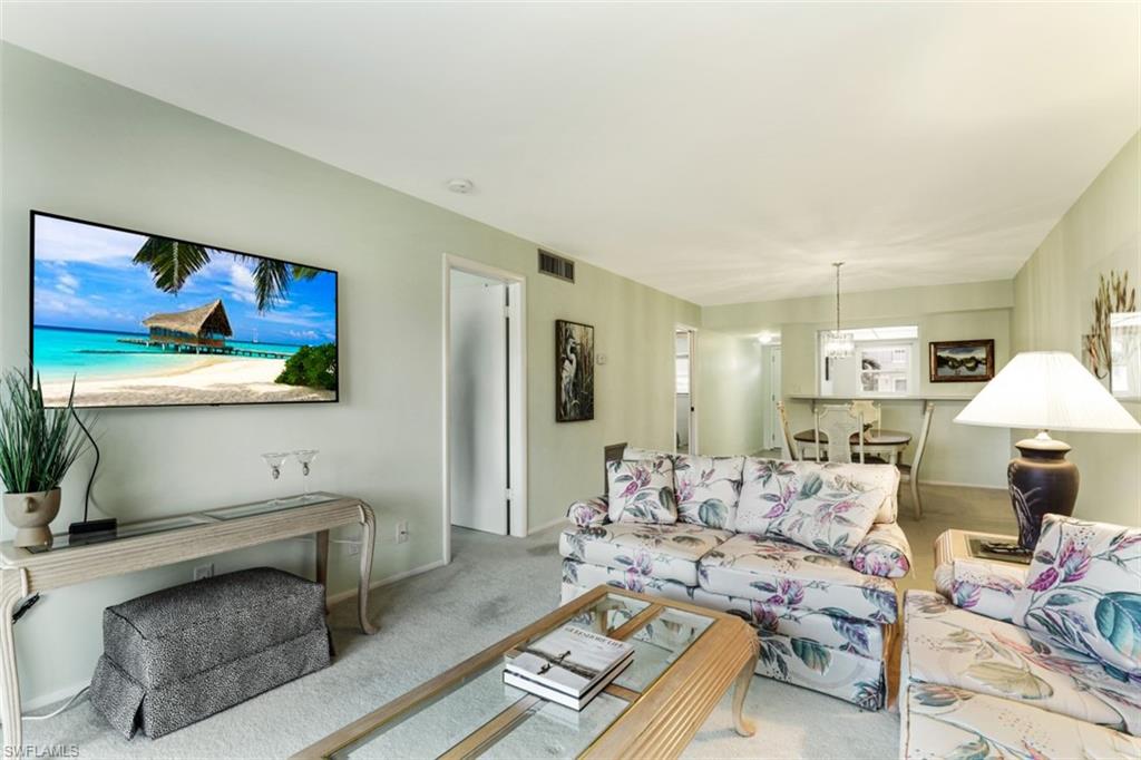 Living room with light carpet