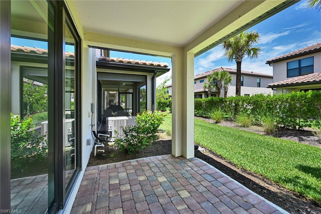 Covered patio and beautifully landscaped backyard at 1519 Lake Jessup — a perfect outdoor entertaining space with lush greenery and room for a pool or garden in the heart of Florida.