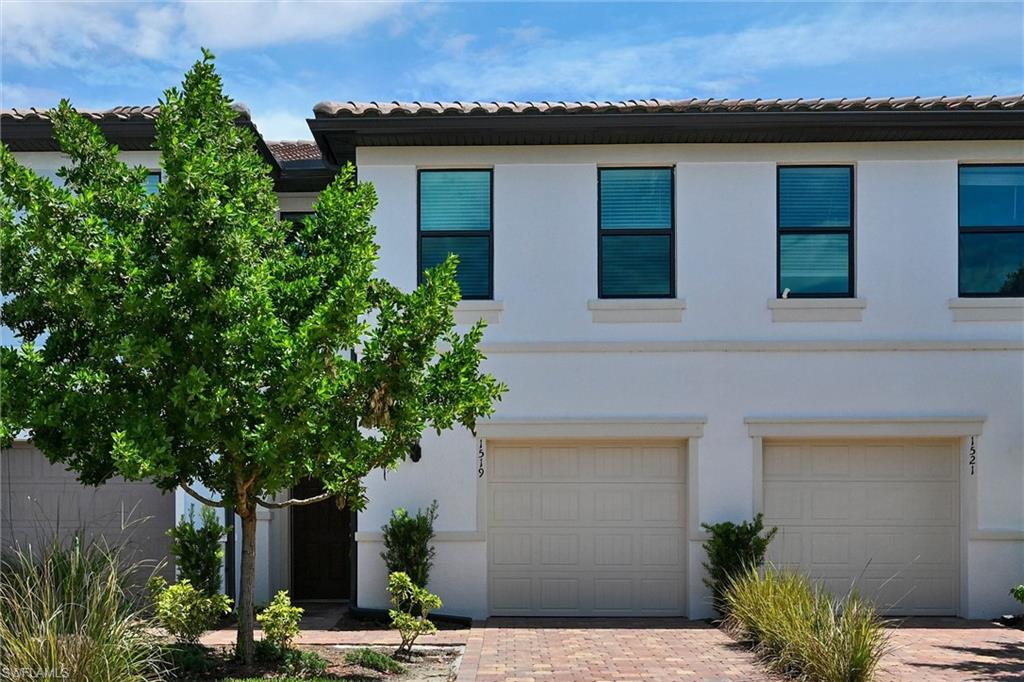 Stunning curb appeal at 1519 Lake Jessup featuring a modern two-story home with a two-car garage, fresh landscaping, and contemporary architectural design in a sought-after Lake Jessup community.