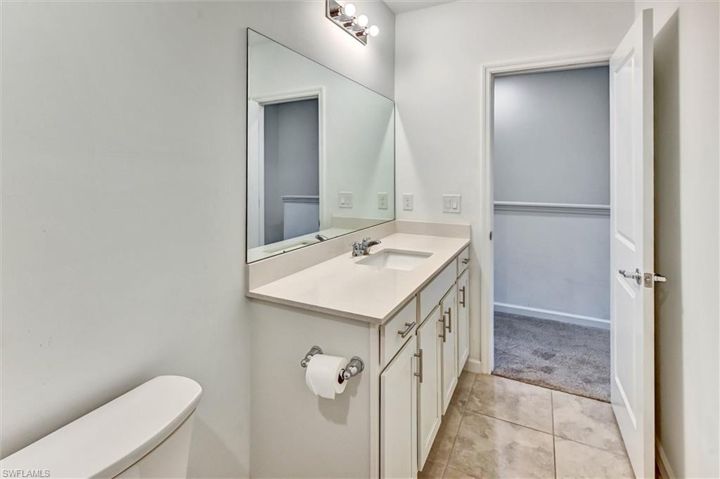 Well-designed full bathroom with a modern vanity, updated fixtures, tile flooring, and a tub-shower combination — clean, bright, and move-in ready.