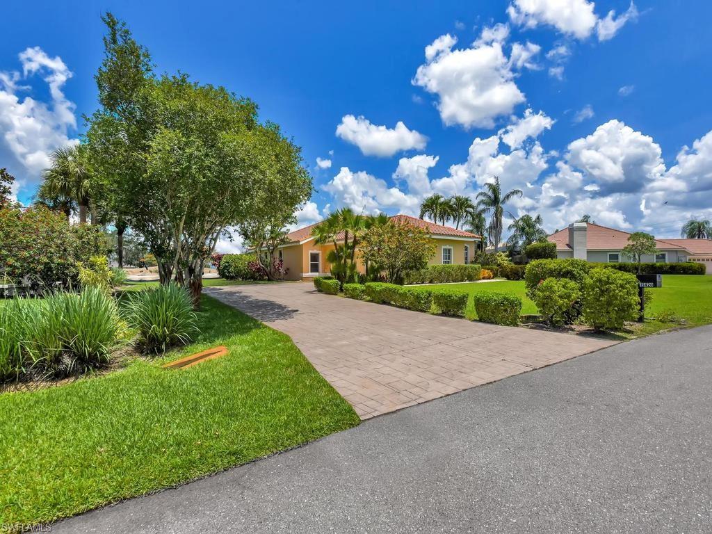 Tropical Landscaping & Long Driveway
