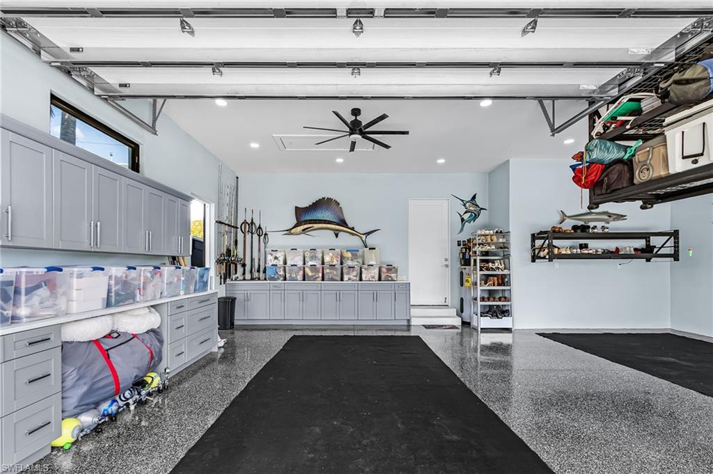 Spacious garage featuring a durable epoxy flooring system