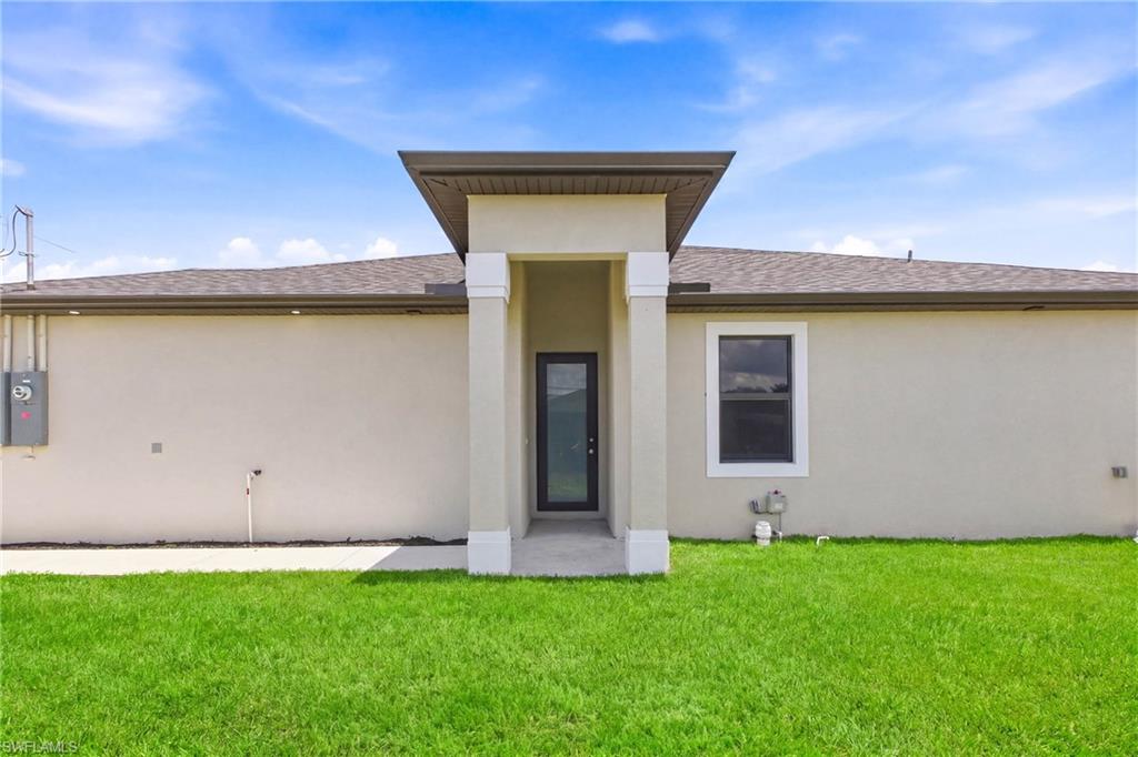 Private entrance to the second unit providing ease of access and privacy.