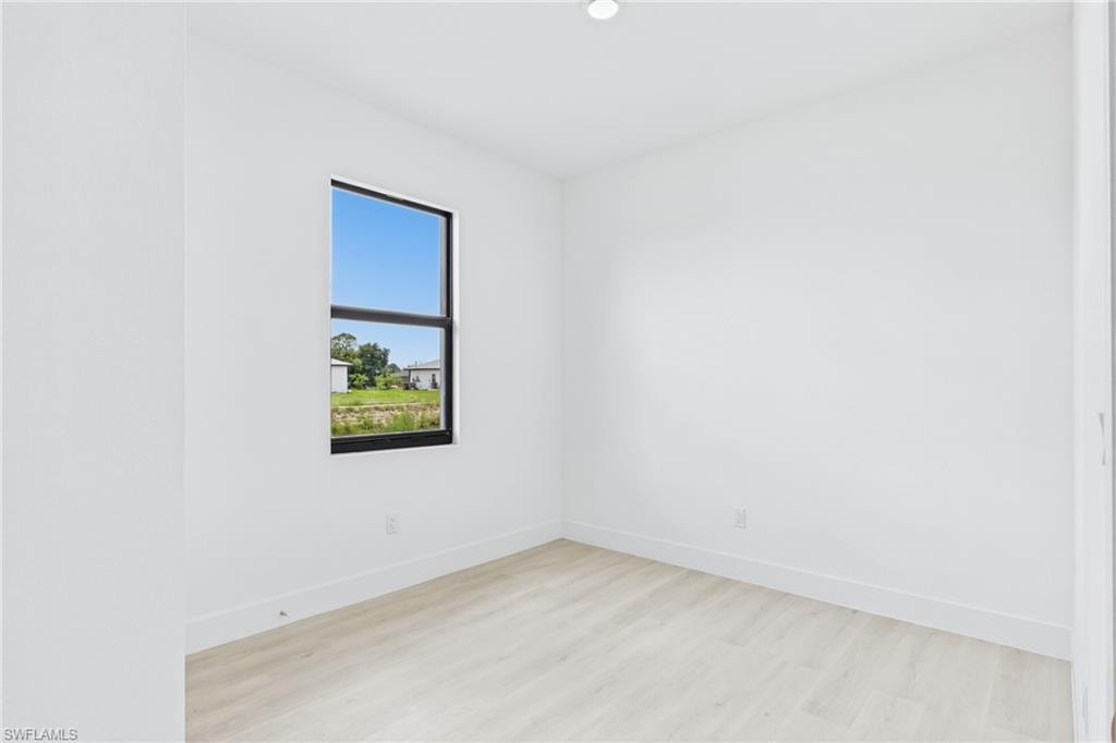 Guest bedroom featuring a peaceful and welcoming atmosphere.
