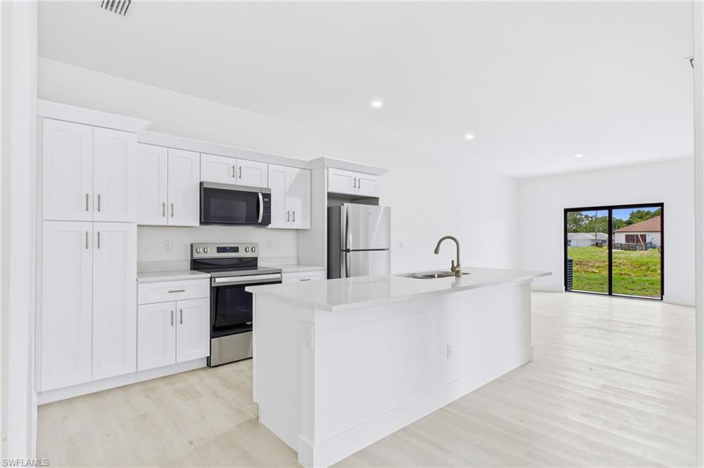 Bright and functional kitchen in Unit 2 perfect for cooking and entertaining.