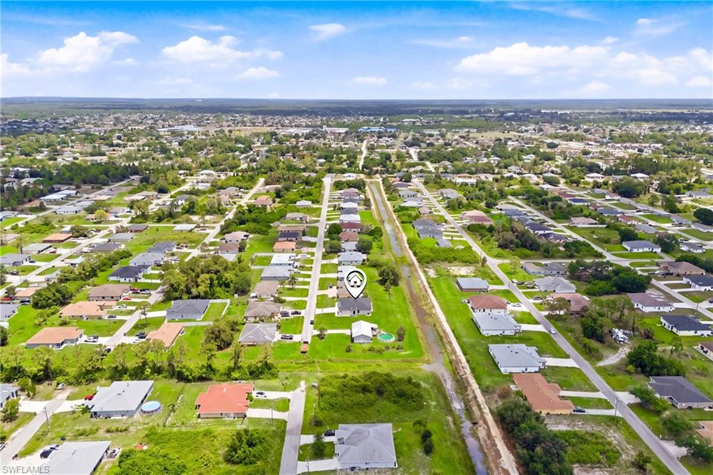 Prime canal-front setting offering privacy, views, and endless potential.