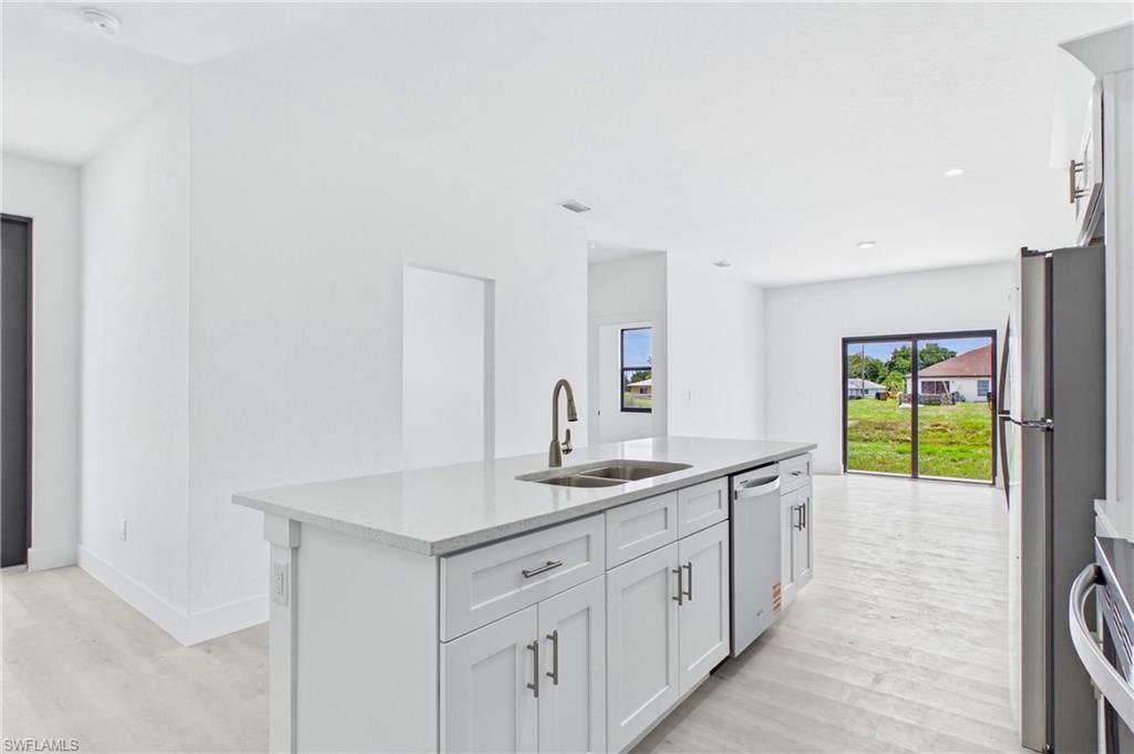 Stylish kitchen and living space designed with today’s lifestyle in mind.