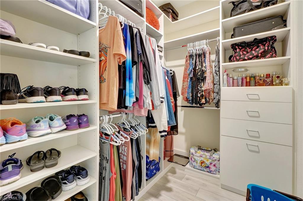 One of 2 walk-in closets in the primary bedroom.