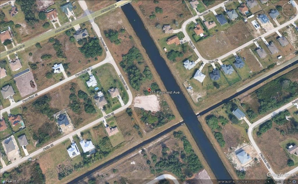 Aerial View. Displaying the property and surrounding geographic features