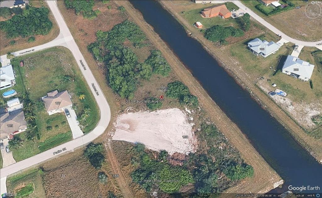 Vacant land parcel featuring canal frontage