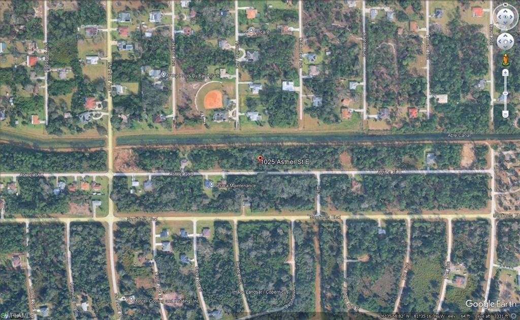 Aerial Map. Displaying the property's location within a residential and undeveloped area
