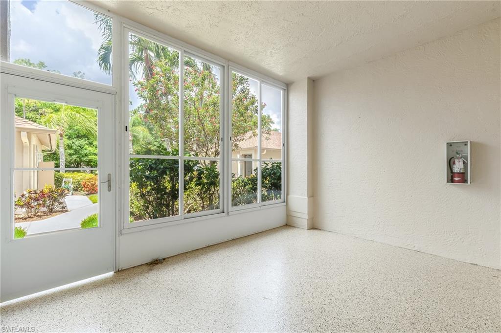 West facing lanai to walkway and your garage