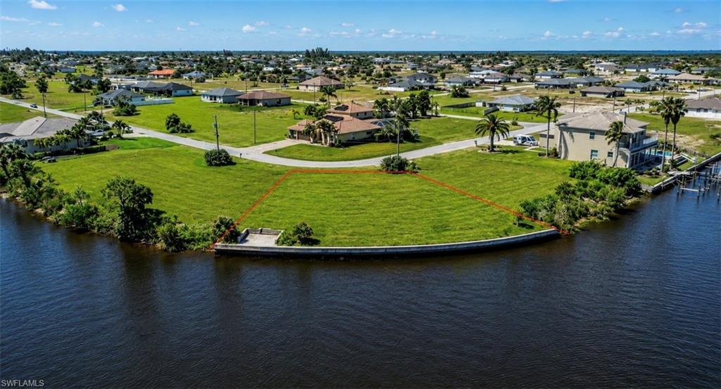 Waterfront lot featuring a seawall and direct water access