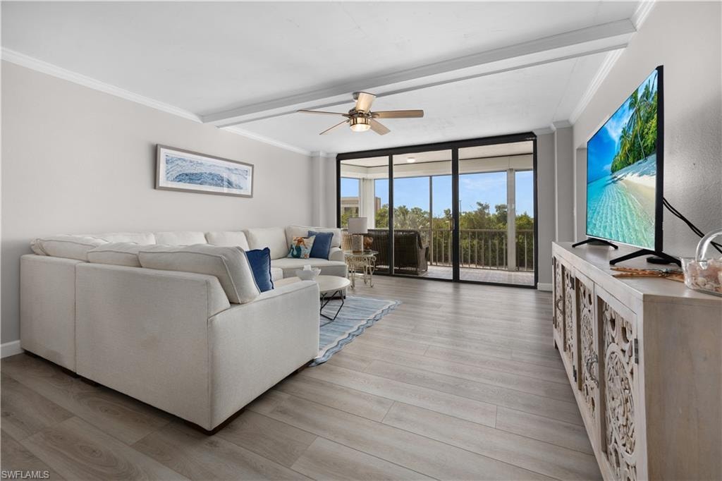 Light-toned wood-finish flooring complements the neutral wall color