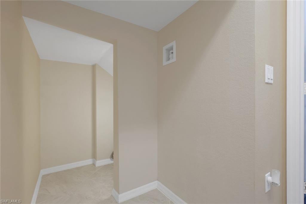 Under-stair storage space.