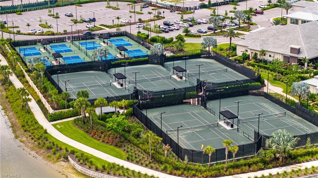 Recreational area featuring multiple tennis and pickleball courts