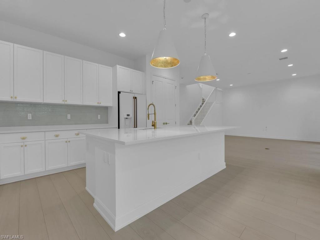 Kitchen w/ Long Breakfast Bar