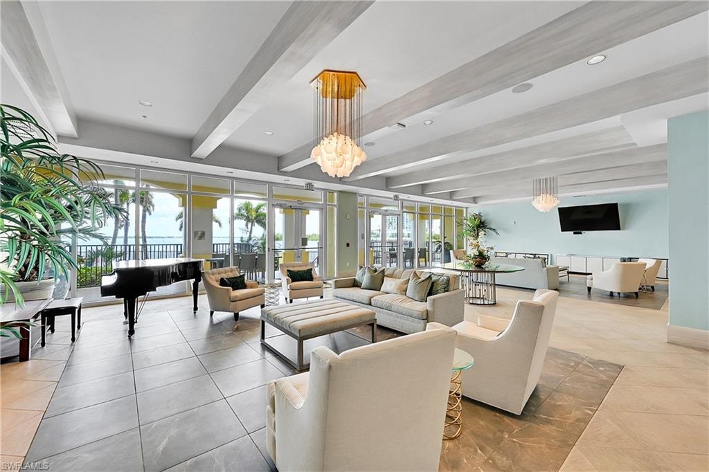Building lobby featuring beam ceiling