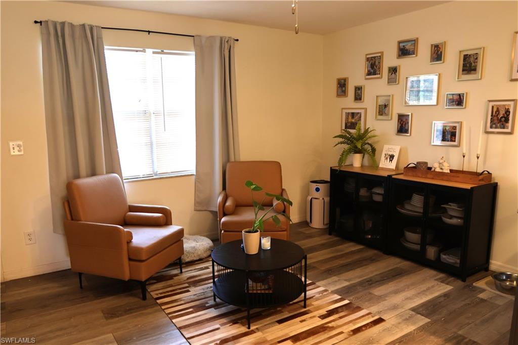 Light-toned walls with wood-finish flooring