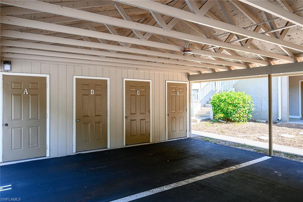 Carport with storage closet and assigned guest spot.