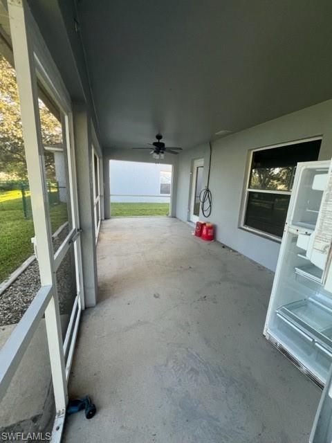View of patio with ceiling fan