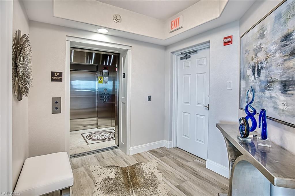 Custom wood panels frame elevator