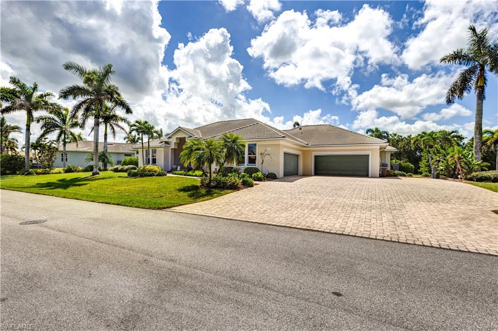 Welcome to 735 Elisa Dr featuring a 4 car extended spacious garage