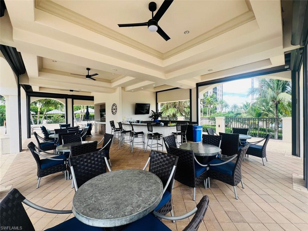 View of patio featuring ceiling fan
