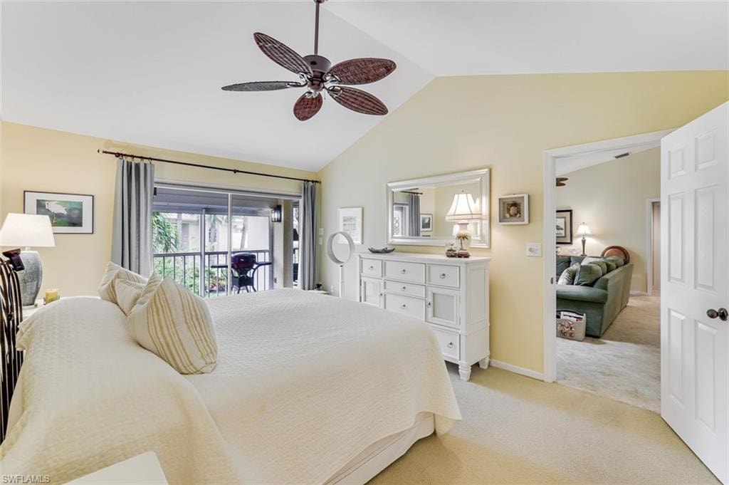Bedroom featuring a vaulted ceiling with a ceiling fan, light wall paint, and carpet flooring