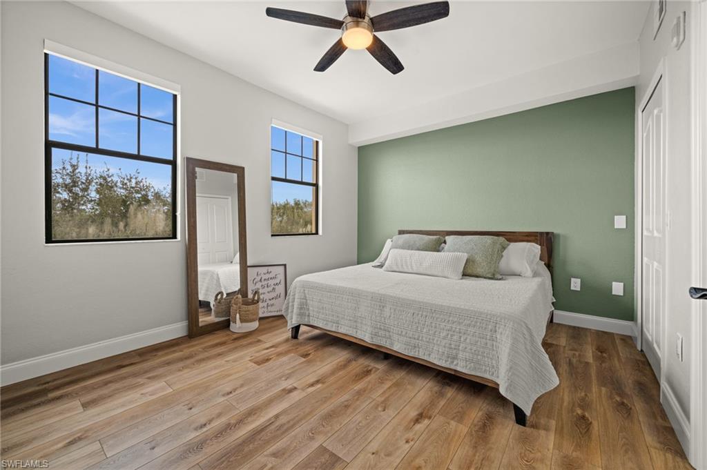 Large sunny & bright master w/ walk in closet